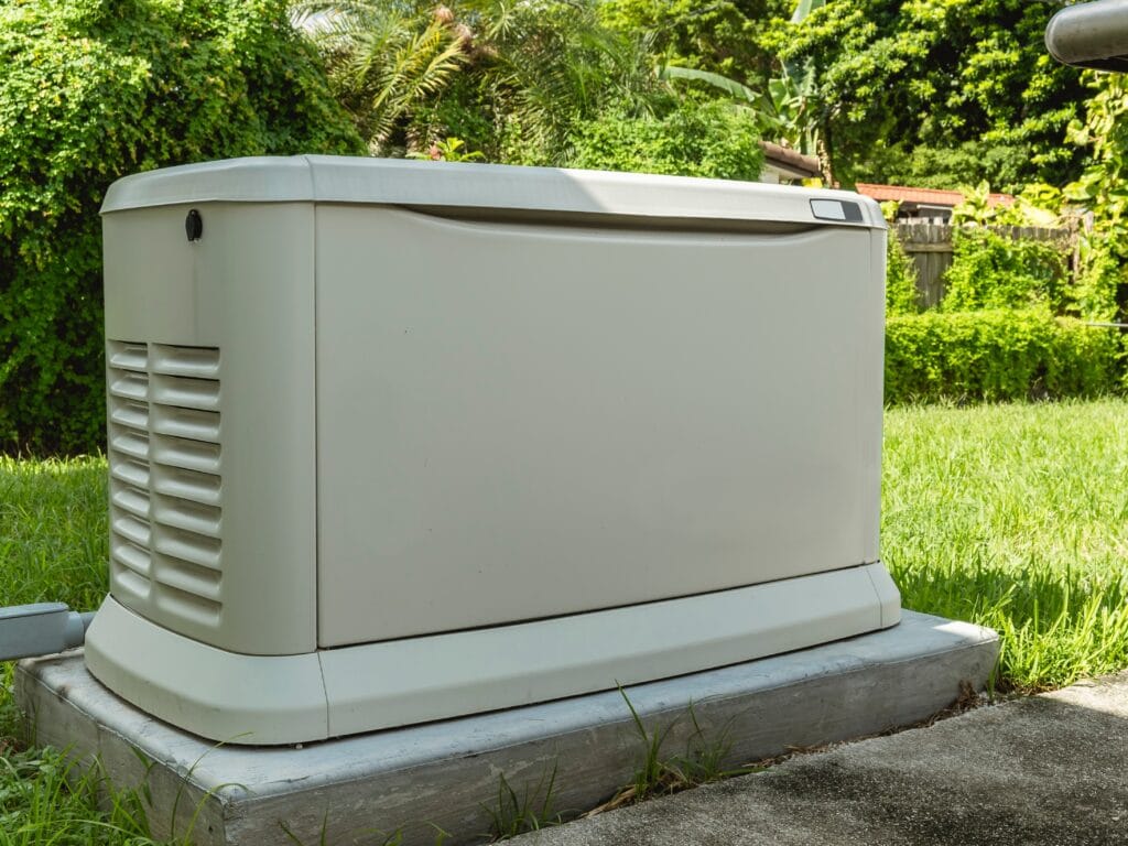 Residential standby generator on a concrete pad