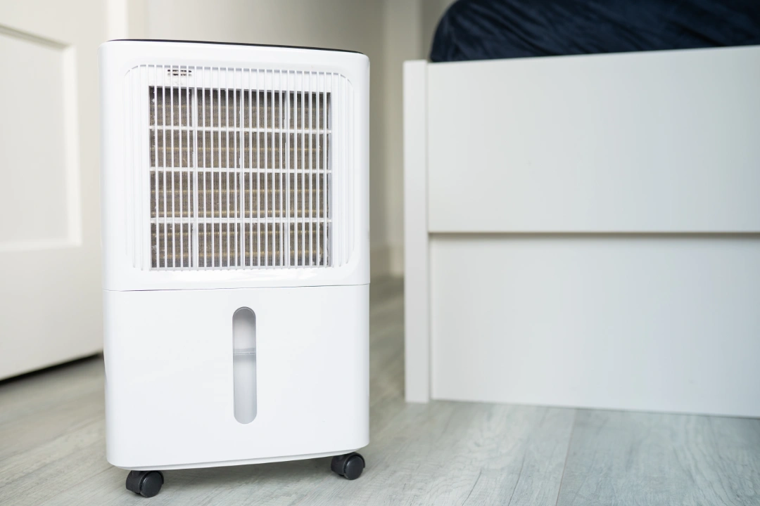 A dehumidifier on the floor